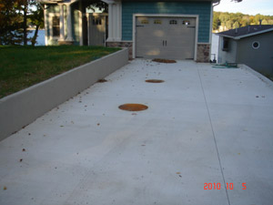 Flood Dose mound, retaining wall and driveway installation