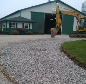 Driveway drainage and installation by Art & Sons Excavating